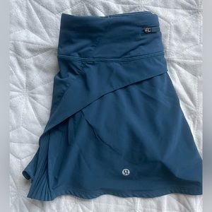 PLAY OFF THE PLEATS SKORT